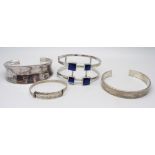 Four silver bangles, 115g, (one smaller size)