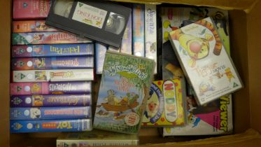 A collection of Walt Disney videos, a Disney Super 8 movie viewer **PLEASE NOTE THIS LOT IS NOT