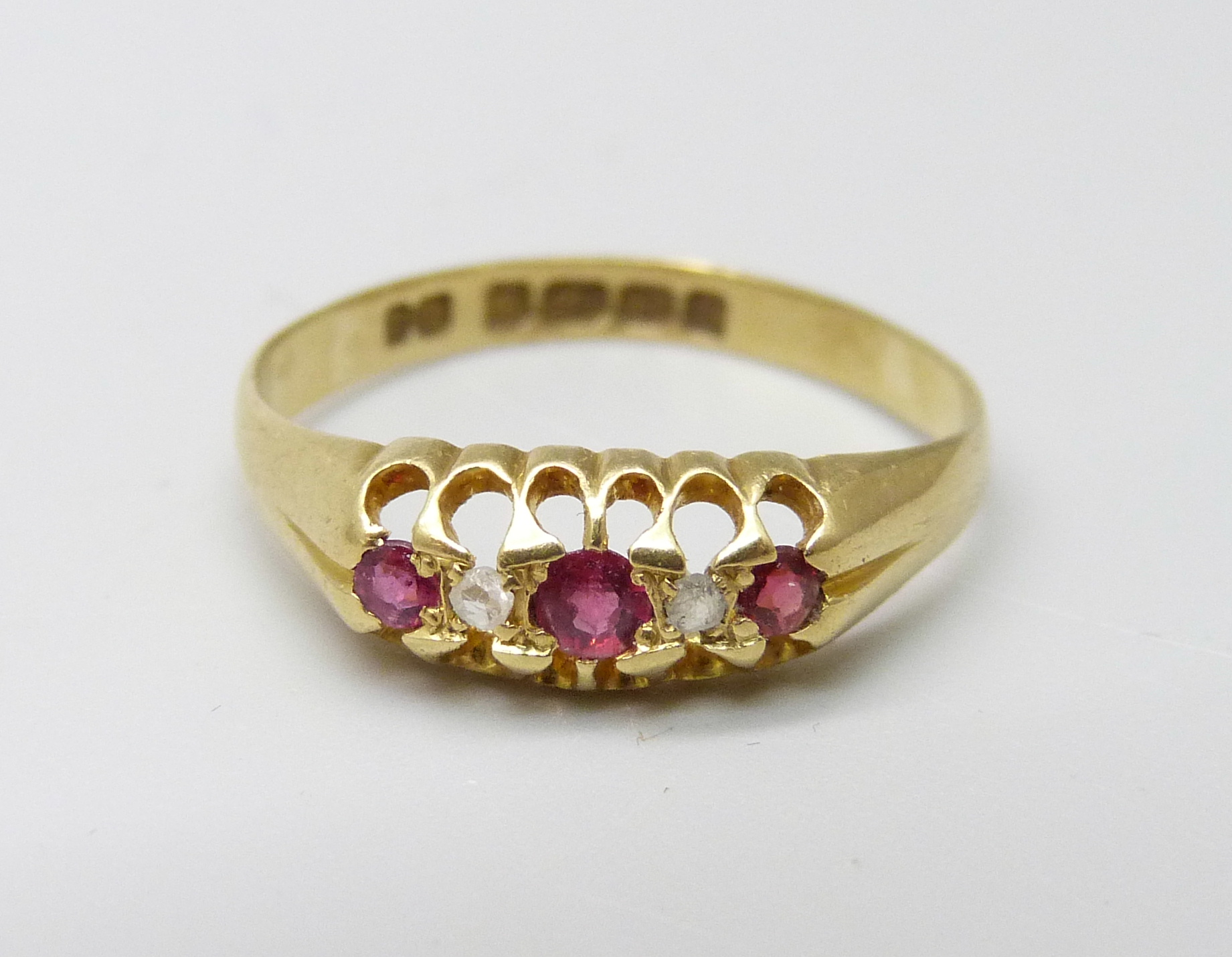 An Edward VII 18ct gold, ruby and diamond ring, Birmingham 1903, 2.1g, O