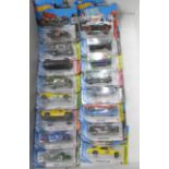 Sixteen Hot Wheels model vehicles in original boxes