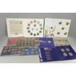 Ten cased coin sets