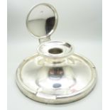 A large silver Capstan inkwell, worn Birmingham hallmark, diameter of base 17.5cm