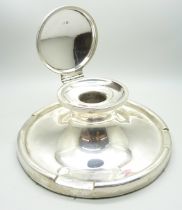 A large silver Capstan inkwell, worn Birmingham hallmark, diameter of base 17.5cm