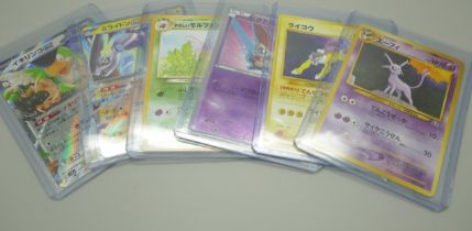 Six Japanese Pokemon cards, including Japanese Espeon No.196 Neo 2 (Podat Master)