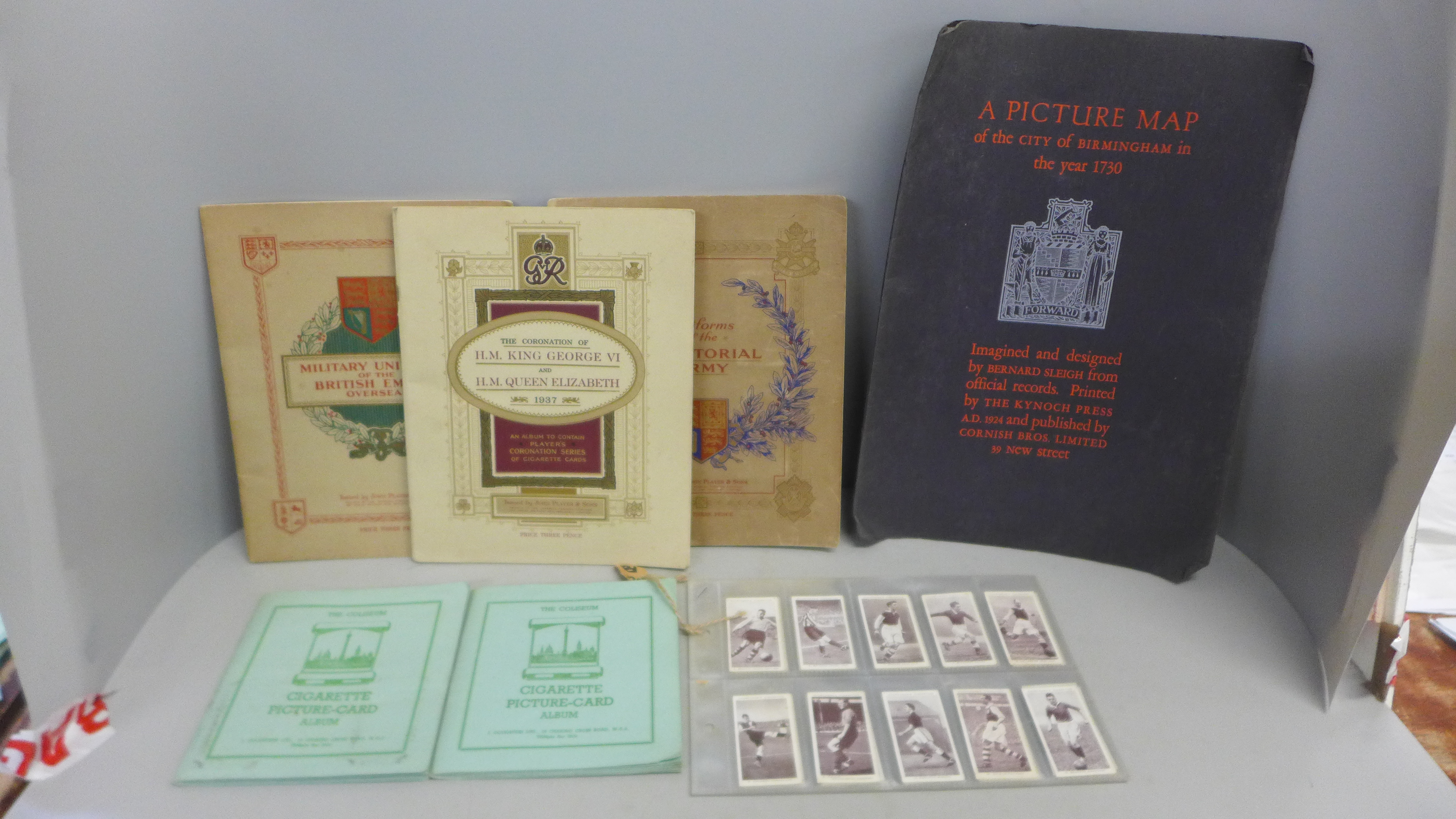 A Players cigarettes set of Birds cards in a picture album, Regimental crests cards in an album,