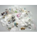 Sixty pairs of vintage clip-on earrings