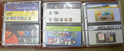 GB 2006-2014 commemorative presentation packs in three special Post Office albums. 120+ packs with