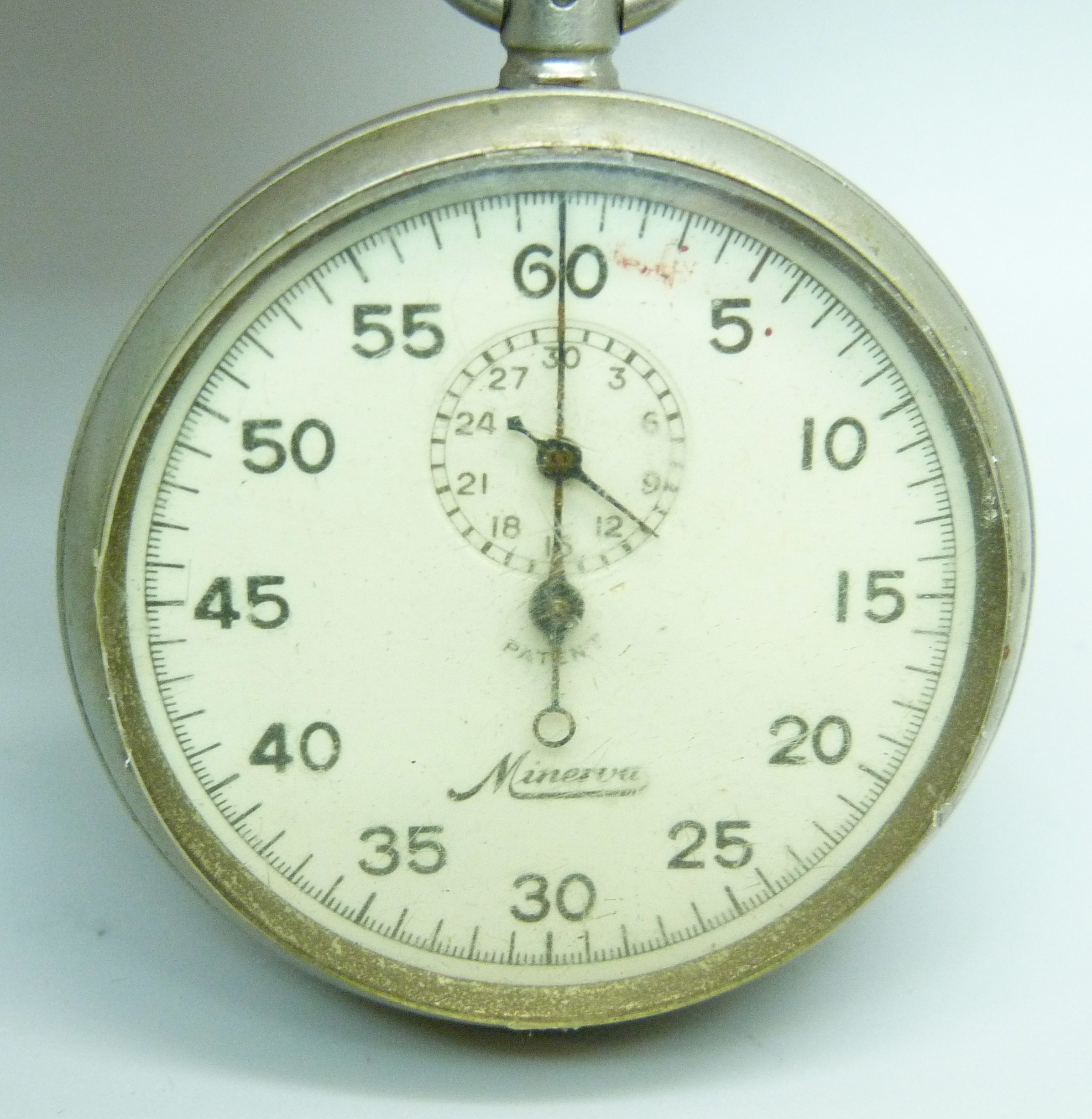 A military pocket watch by Minerva, with broad arrow inscription to reverse and engraved 28660, patt