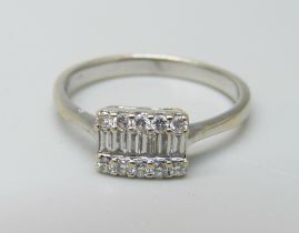 An 18ct white gold and diamond ring, 3.5g, R
