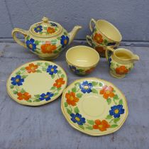 A tea set from Barker Bros ltd, 'June Day' two tea cups, 3 saucers, teapot, sugar and milk jug **