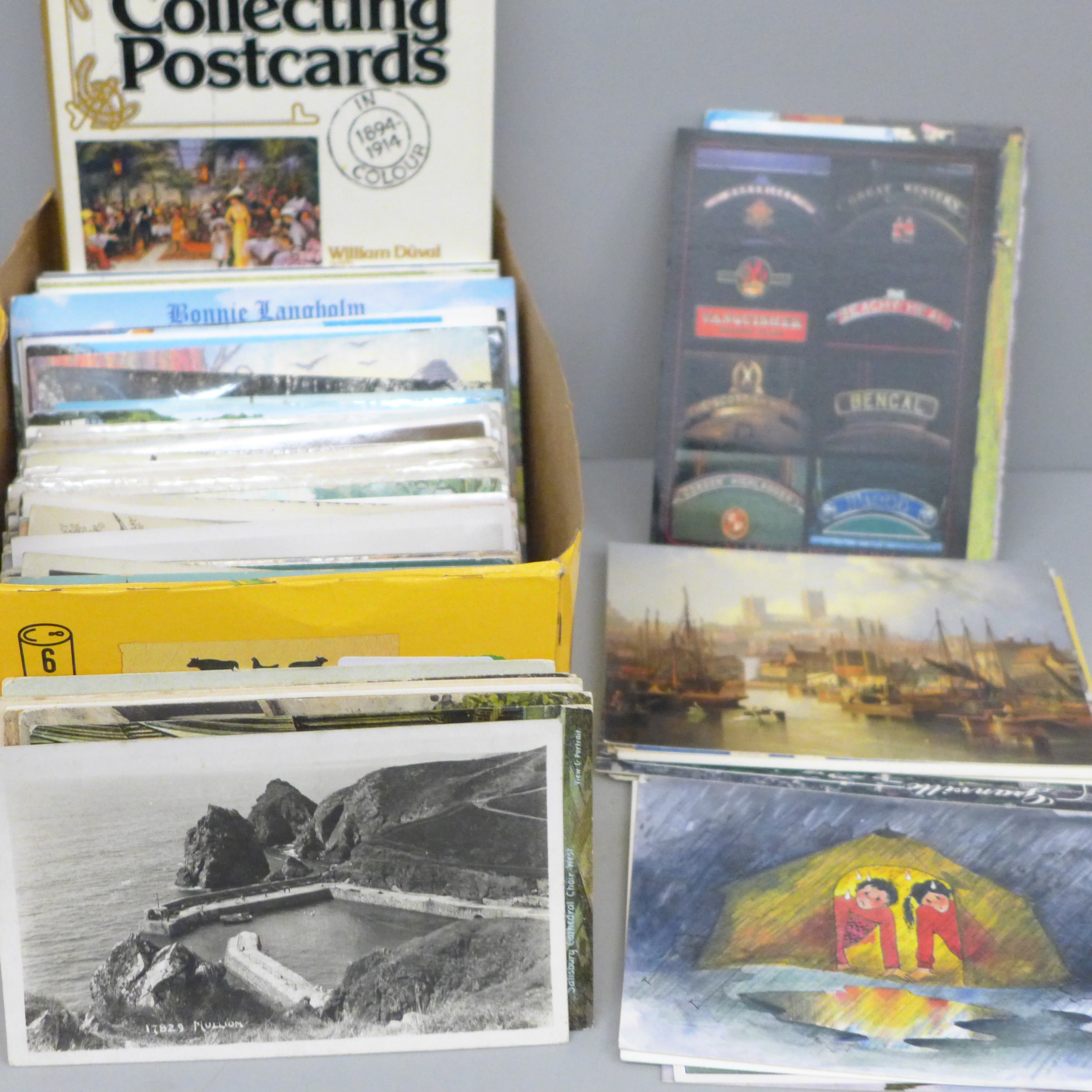 A box of postcards, vintage to modern