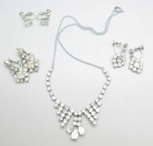 A pair of Jewelcraft earrings, two other pairs of drop earrings and a necklace, all rhodium