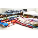 A collection of designer scarves including Leonardi, Roberta, Aveda x Philip Lin, Jacqmar, Monique