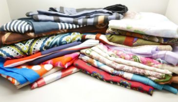 A collection of designer scarves including Leonardi, Roberta, Aveda x Philip Lin, Jacqmar, Monique