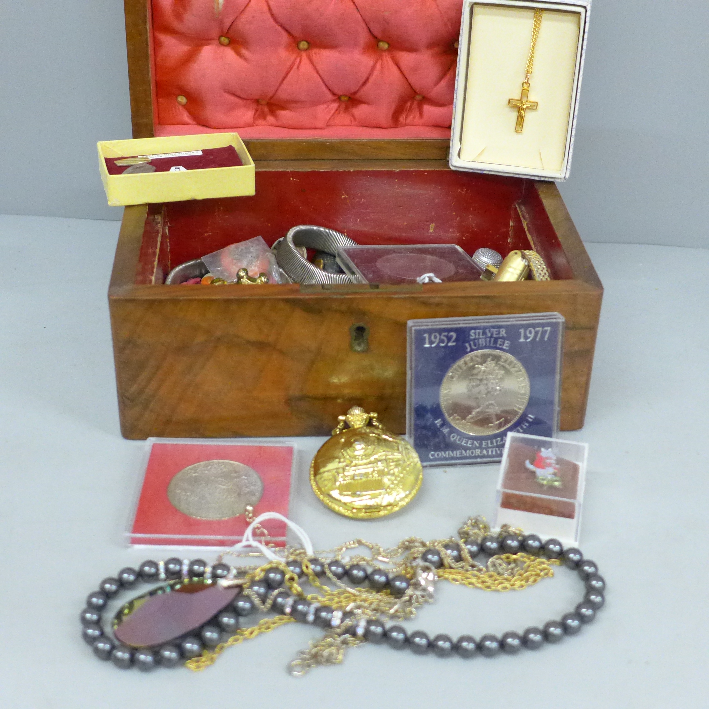 A collection of costume jewellery, cufflinks and commemorative crowns, etc.