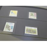 A black case with a collection of mint Faroe Island stamps in blocks