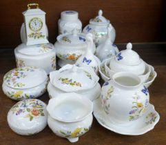 A collection of Aynsley Cottage Garden lidded pots, bells, clock and bowls, seventeen in total