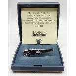 A hallmarked Swedish silver tie-clip, limited edition solid silver 'Sandvik Handsaws', 075, boxed