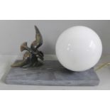 An Art Deco lamp with bird decoration on a marble plinth