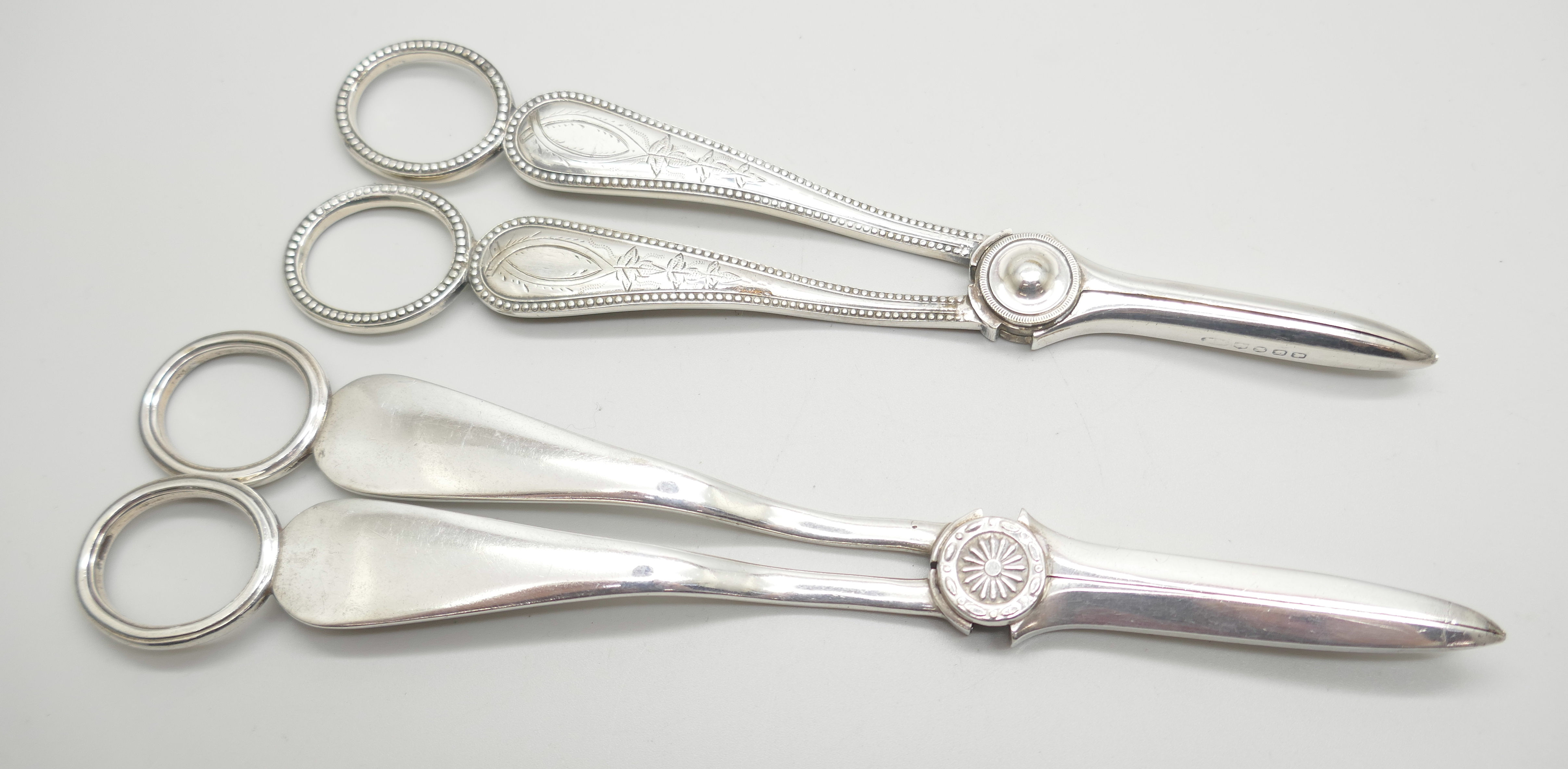 Two pairs of grape scissors, c1900