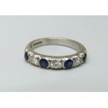 An 18ct white gold, diamond and sapphire ring, Sheffield 1977, 5.1g, Q, over 0.5ct total diamond