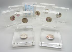 Ten cased Beatrix Potter 50p coins