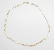 A 9ct gold and diamond necklace, 16.6g, 39cm