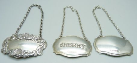 Three silver wine labels, one marked sherry, two unmarked