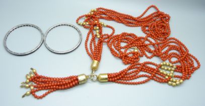 A vintage silver gilt and faux coral necklace, approximately 107cm, and two white metal and stone
