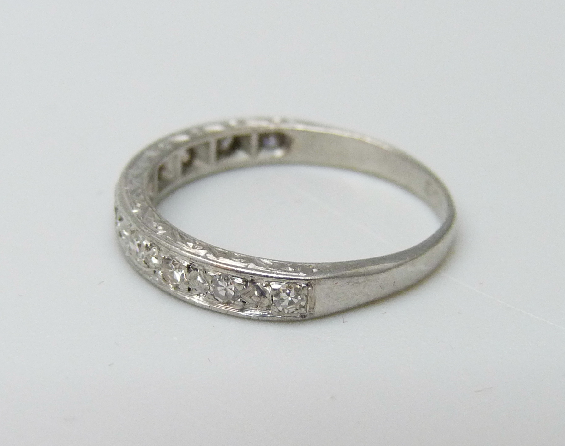 An 18ct white gold and diamond half-eternity ring, 2.2g, K - Image 2 of 3