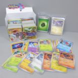 500 x Pokemon cards, including 30 holographic cards, various sets in collectors boxes