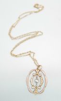 An Edwardian 9ct gold pendant and chain, 2g