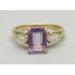 A 9ct gold ring set with a pink and two white stones, 2.3g, N