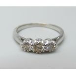 An 18ct white gold and diamond trilogy ring, 0.5ct total diamond weight marked on the shank, 3.2g, O