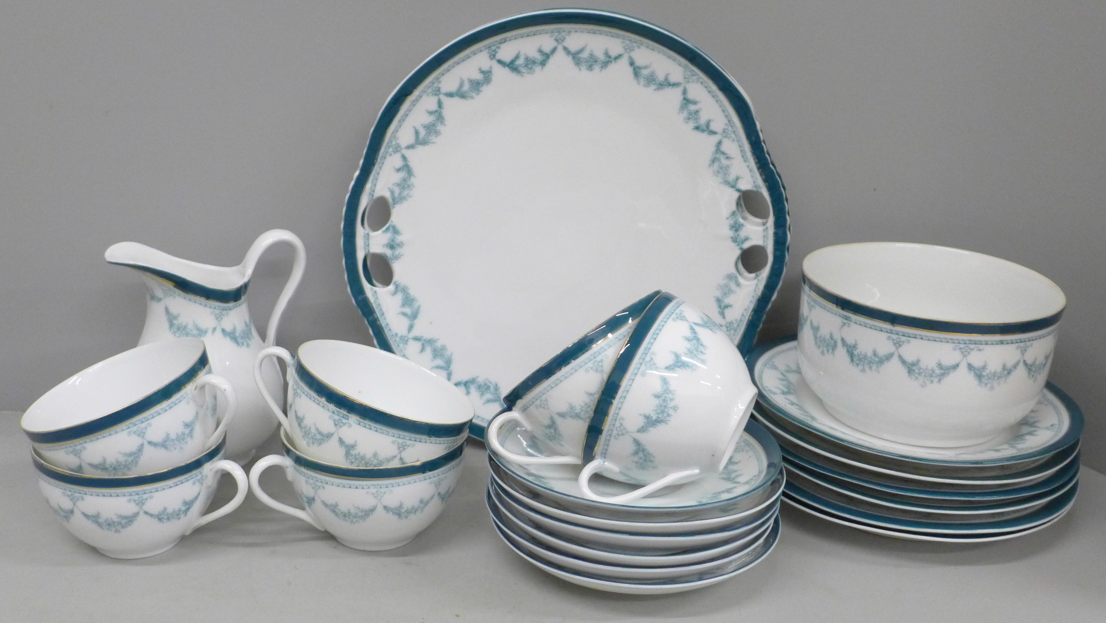 An Edwardian six setting china tea set