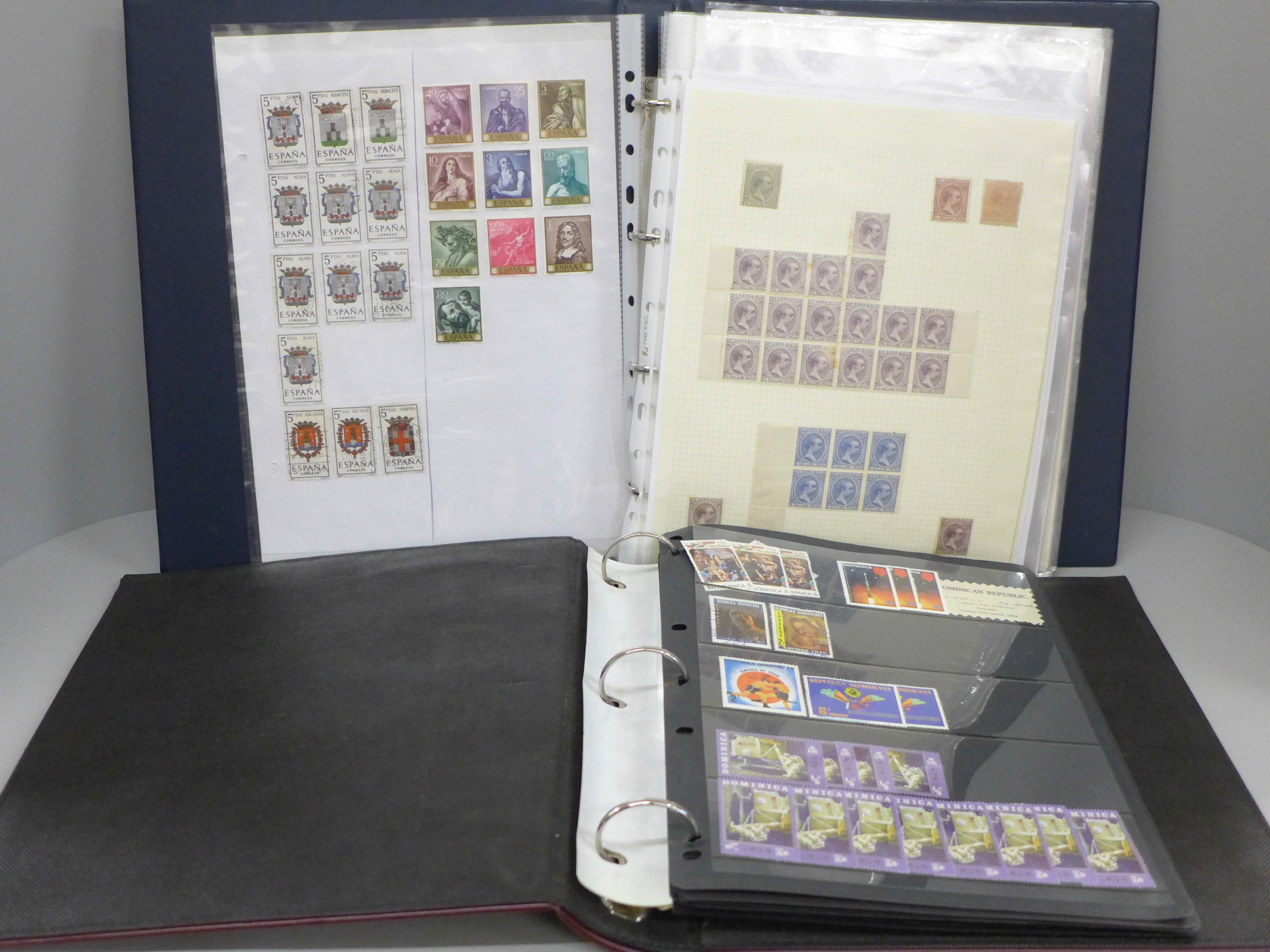 Two albums of stamps including Dominica, Puerto Rico, Espagna, etc.