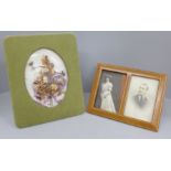 An Edwardian dried flower display under a convex glass with silk photograph frame and a double