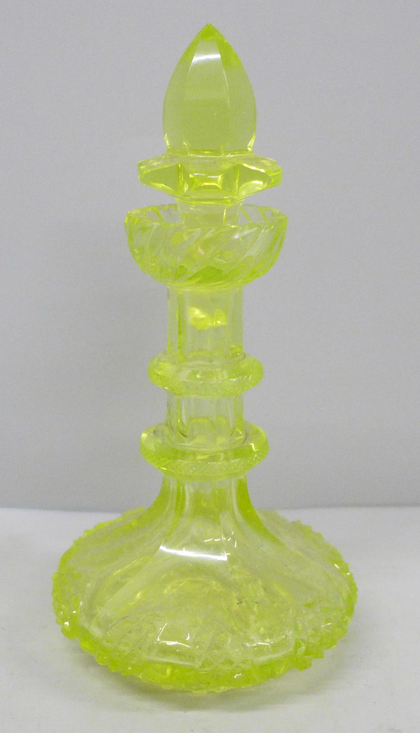 A 19th Century uranium glass scent bottle, stopper a/f, 15cm