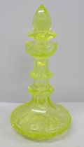 A 19th Century uranium glass scent bottle, stopper a/f, 15cm