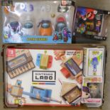 A collection of children's toys and games, including Nintendo Labo, Pop Yesss and Vanessa Kensington