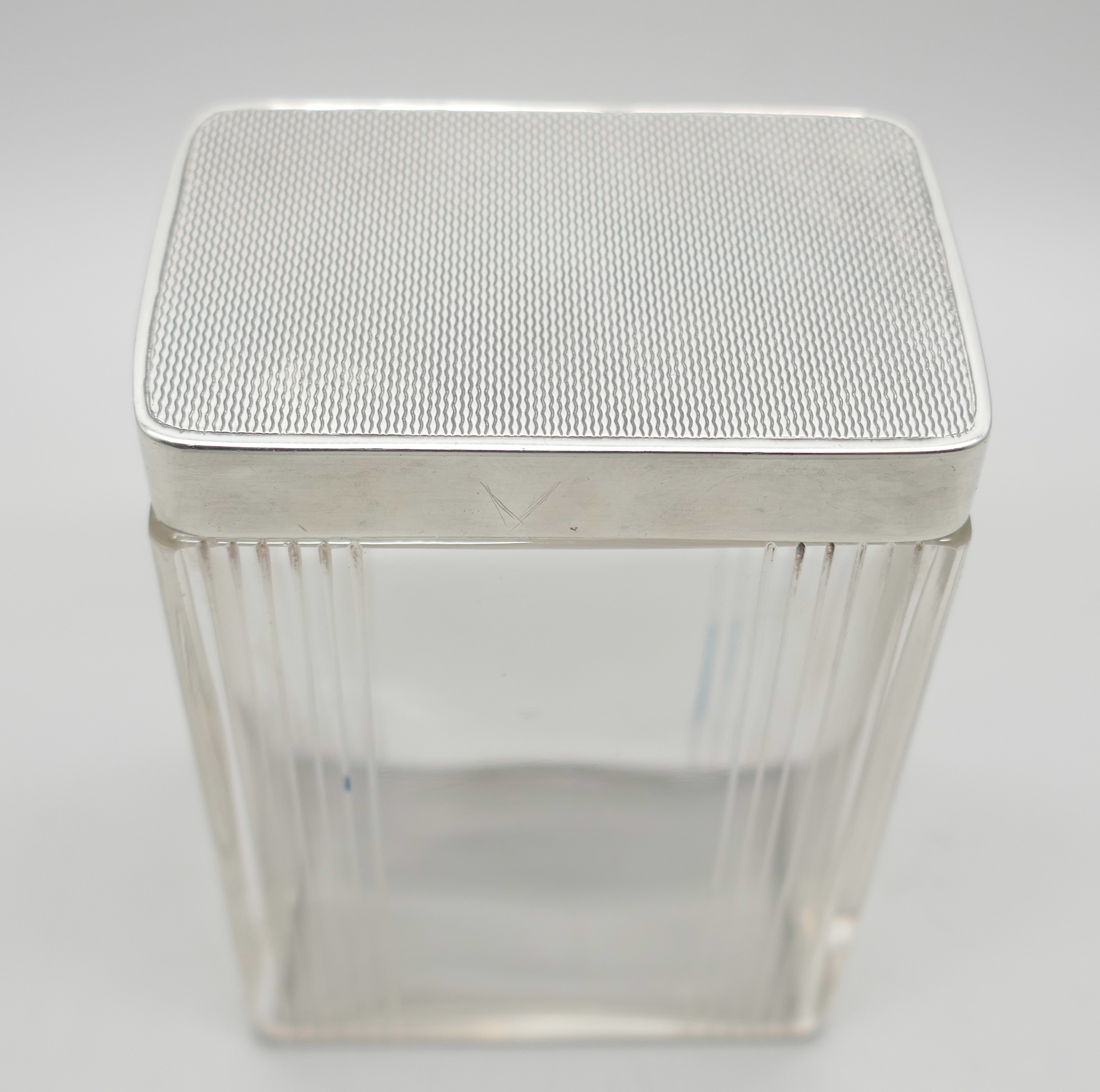 An Art Deco silver topped cut glass jar. Birmingham 1939, height 88mm - Image 2 of 3
