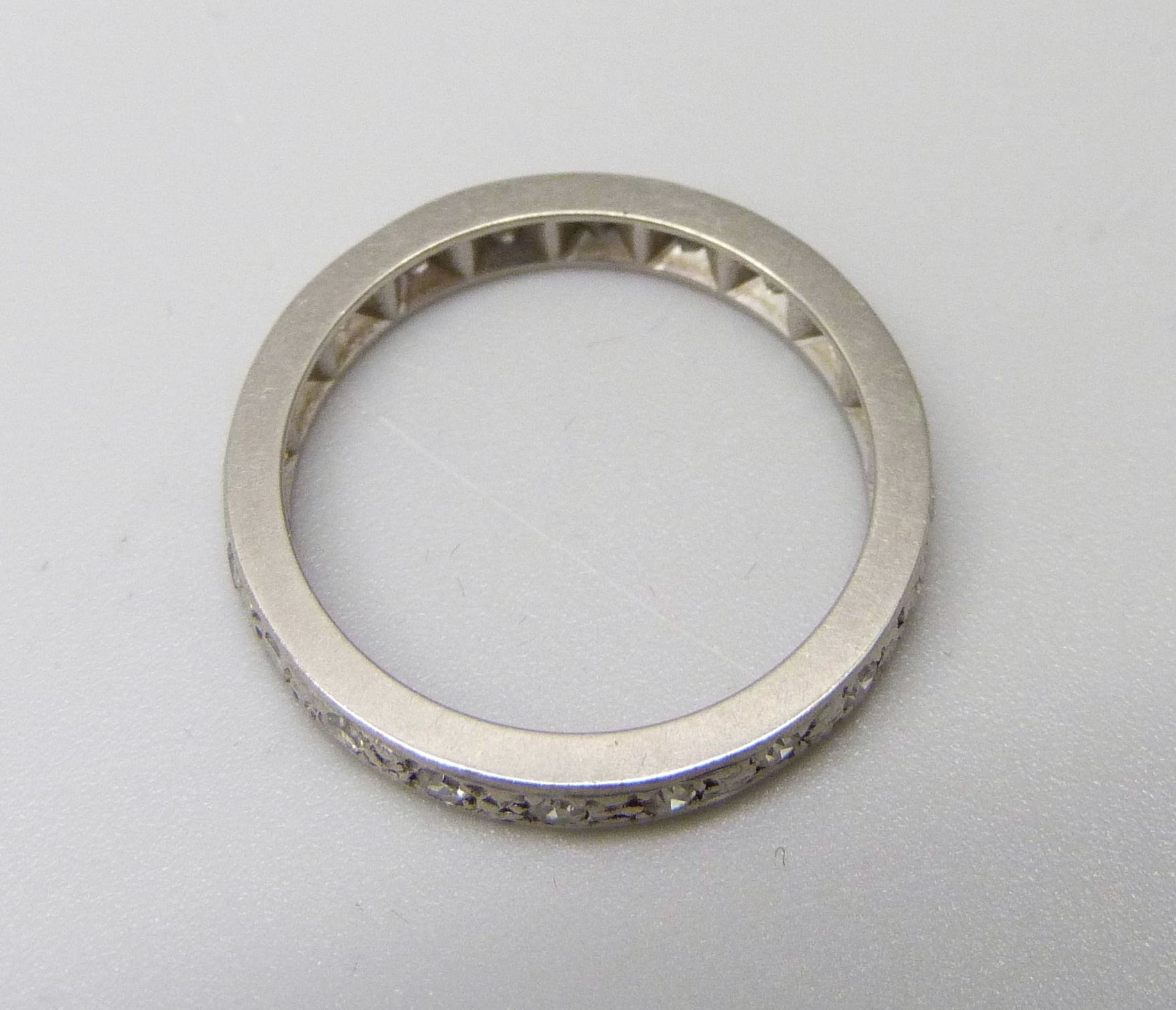 A white metal and diamond eternity ring, 3.4g, L - Image 2 of 3