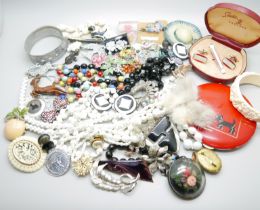 A collection of costume jewellery, compact, etc.