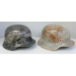 Two German WWII M40 and M42 helmets