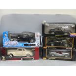 Five 1/8 scale model vehicles, Maisto, Hot Wheels, Yatming, all boxed, boxes a/f