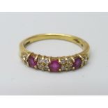 An 18ct gold, ruby and diamond ring, 2.9g, N