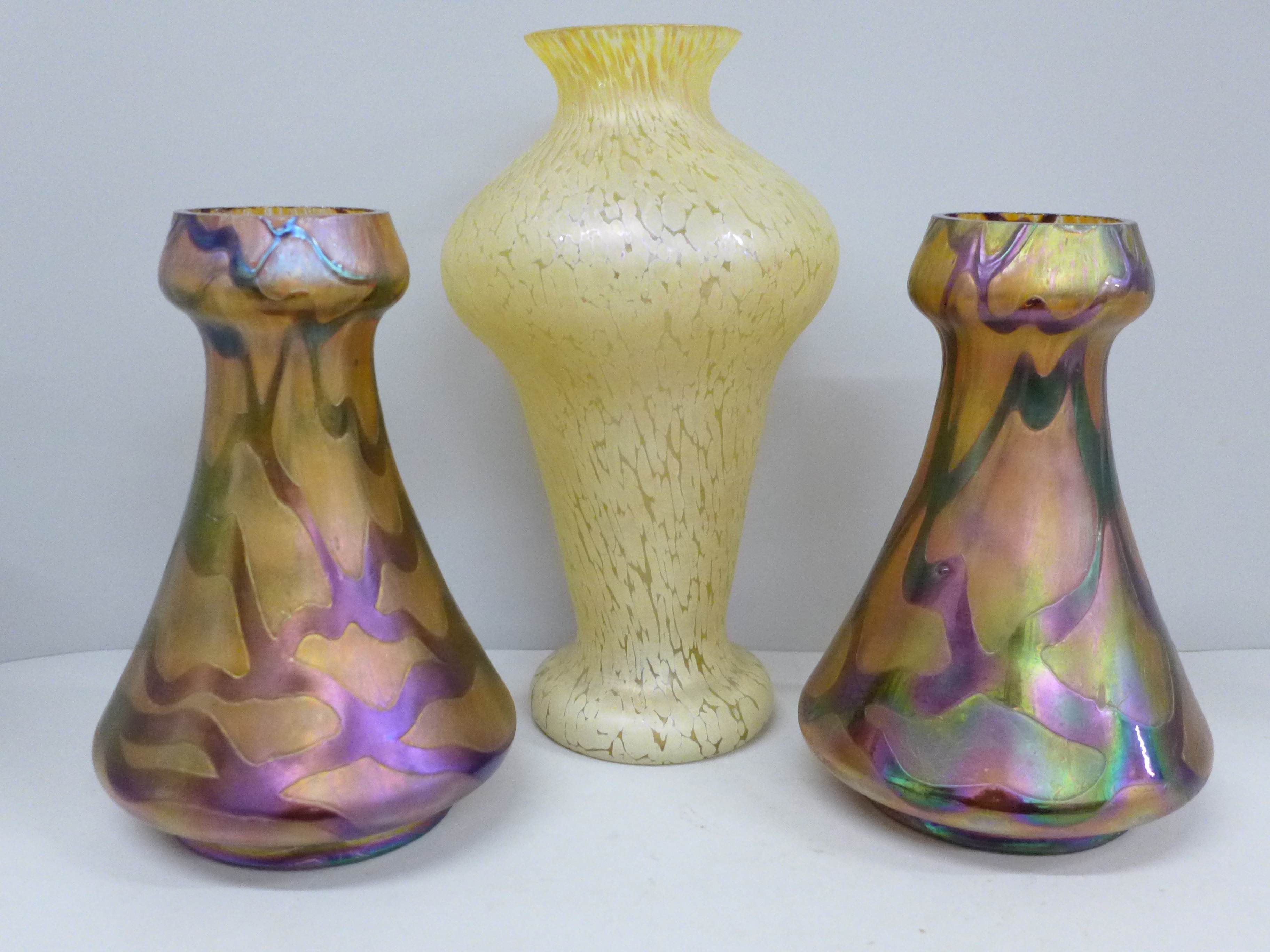 Czech glass; a pair of vases and a cream oil slick vase, pair with chips inside rim and cream vase