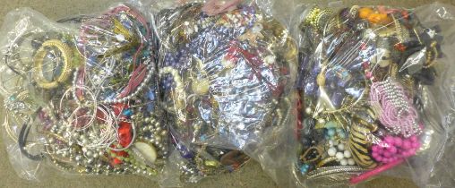 Three large bags of costume jewellery