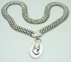 A silver Aesthetic style collarette and pendant, 62g
