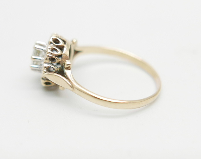 A 9ct gold ring set with a clear central stone and diamond chip halo, 2.2g, O - Image 4 of 5